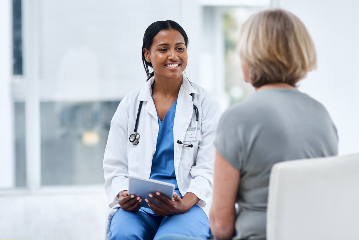 patient talking to doctor